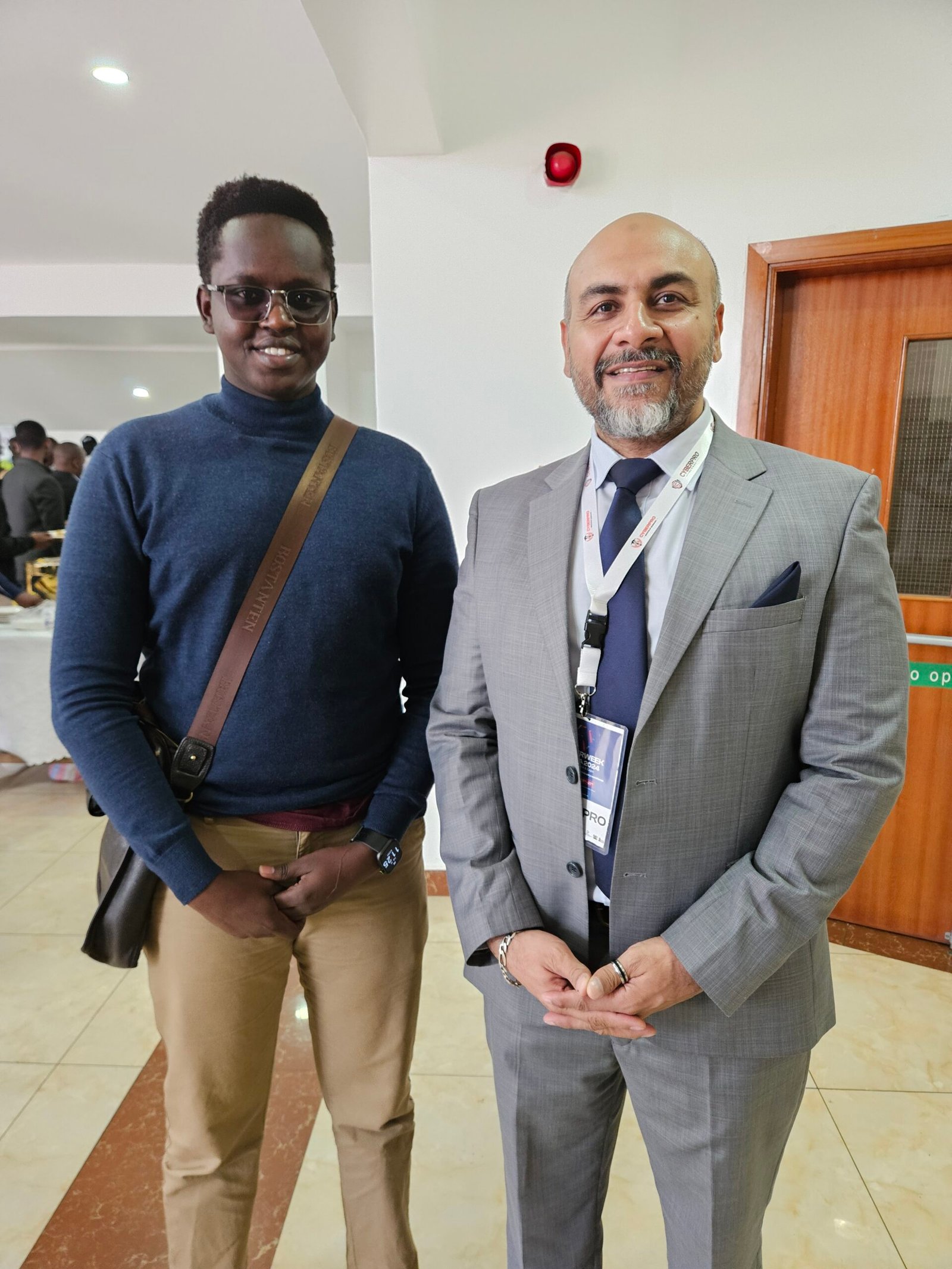 Bill Kipkemboi Kimutai networking with Haider Chaudhary at Cyberweek Africa 2024.